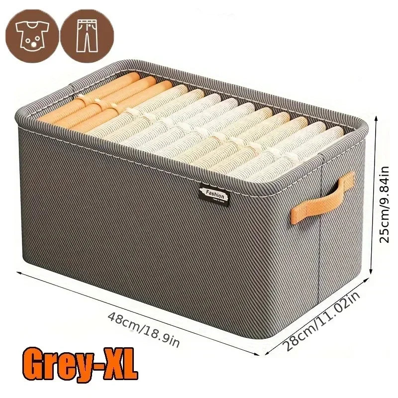 Caixa organizadora cinza XL com divisórias para roupas, alça lateral e medidas exibidas.